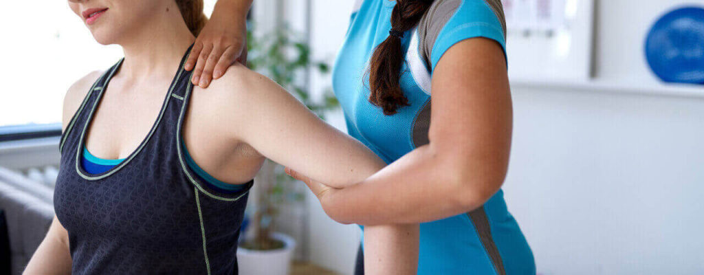 A woman being attended after a surgery